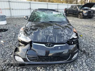 2017 Hyundai Veloster Value Edition with VIN KMHTC6AD5HU322111, listed as a Copart auction lot 51041695 with 56,602 mi miles and Salvage Title. Bid and sale history available at carsss.com. Image 5.