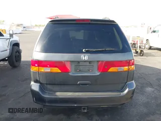 2002 Honda Odyssey EX with VIN 2HKRL18632H512158, listed as a IAAI auction lot 42354621 with 240,373 mi miles and . Bid and sale history available at DreamBid. Image 14.