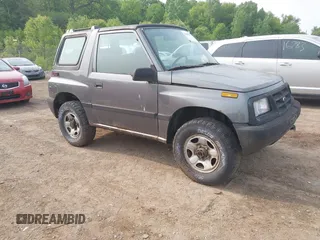 1997 Chevrolet Tracker z VIN 2CNBJ1863V6906951, wystawiony jako IAAI lot #42400087 z przebiegiem 209 563 mil mil oraz . Historia ofert i sprzedaży dostępna na DreamBid. Obrazek 1.