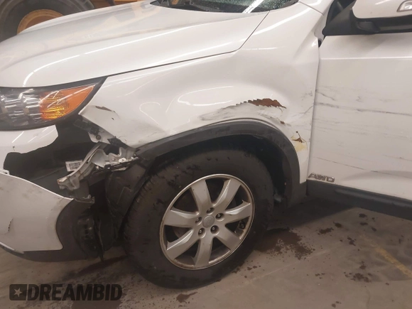 2012 Kia Sorento LX with VIN 5XYKTDA2XCG250013, listed as a IAAI auction lot 41863672 with 172,118 mi miles. Bid and sale history available at carsss.com. Image 6.