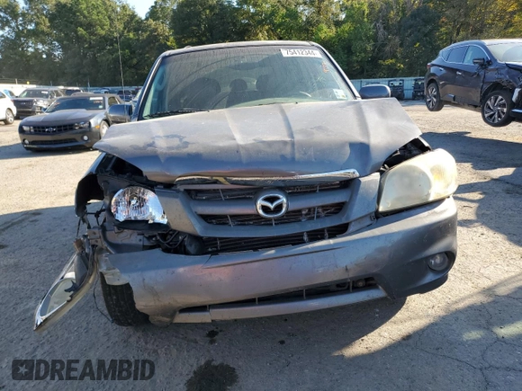 2006 Mazda Tribute S with VIN 4F2YZ06136KM31485, listed as a Copart auction lot 75412344 with Not Provided miles and Salvage Title. Bid and sale history available at DreamBid. Image 5.