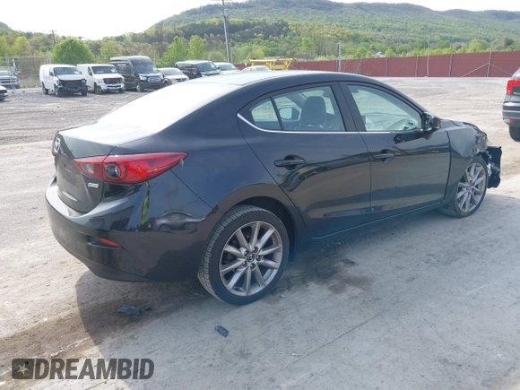 2017 Mazda 3 Touring z VIN 3MZBN1V74HM133565, wystawiony jako IAAI lot #42160836 z przebiegiem 104 997 mil mil oraz . Historia ofert i sprzedaży dostępna na DreamBid. Obrazek 4.