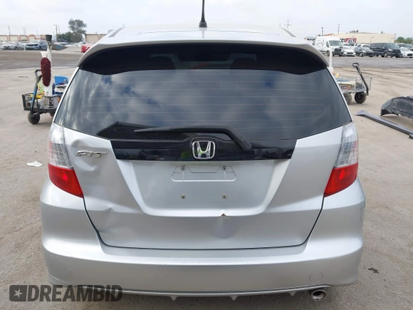 2013 Honda Fit Sport with VIN JHMGE8H58DC003021, listed as a IAAI auction lot 42120318 with 233,056 mi miles. Bid and sale history available at carsss.com. Image 17.