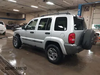 2004 Jeep Liberty Sport with VIN 1J4GL48K44W182897, listed as a IAAI auction lot 40768956 with 241,550 mi miles and . Bid and sale history available at DreamBid. Image 3.