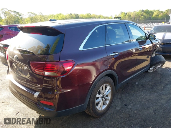 2019 Kia Sorento LX z VIN 5XYPG4A56KG481297, wystawiony jako IAAI lot #41994392 z przebiegiem 147 688 mil mil oraz . Historia ofert i sprzedaży dostępna na DreamBid. Obrazek 4.