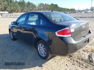 2009 Ford Focus SE with VIN 1FAHP35N29W246035, listed as a IAAI auction lot 42041059 with 146,416 mi miles. Bid and sale history available at carsss.com. Image 3.
