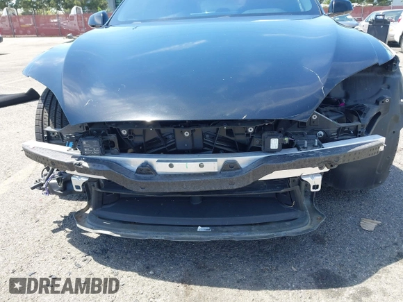 2022 Tesla Model S with VIN 5YJSA1E51NF464231, listed as a IAAI auction lot 42077838 with 53,290 mi miles and . Bid and sale history available at DreamBid. Image 6.