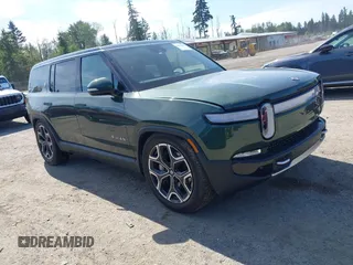 2023 Rivian R1S Adventure z VIN 7PDSGBBA9PN029640, wystawiony jako IAAI lot #42465014 z przebiegiem Nie podano mil oraz . Historia ofert i sprzedaży dostępna na DreamBid. Obrazek 1.