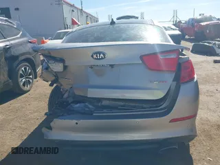 2014 Kia Optima EX z VIN 5XXGN4A74EG260054, wystawiony jako IAAI lot #41464688 z przebiegiem 40 498 mil mil oraz . Historia ofert i sprzedaży dostępna na DreamBid. Obrazek 16.
