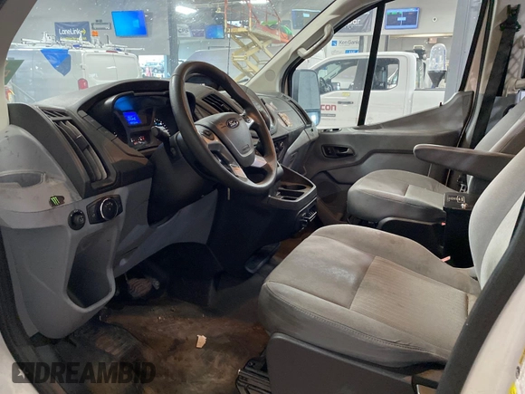 2018 Ford Transit with VIN 1FTYR1YGXJKA49048, listed as a IAAI auction lot 42843478 with 99,161 mi miles and . Bid and sale history available at DreamBid. Image 3.