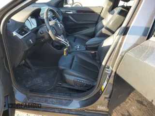 2020 BMW X2 xDrive28i with VIN WBXYJ1C00L5P51384, listed as a Copart auction lot 87406814 with 52,807 mi miles and Salvage Title. Bid and sale history available at carsss.com. Image 7.