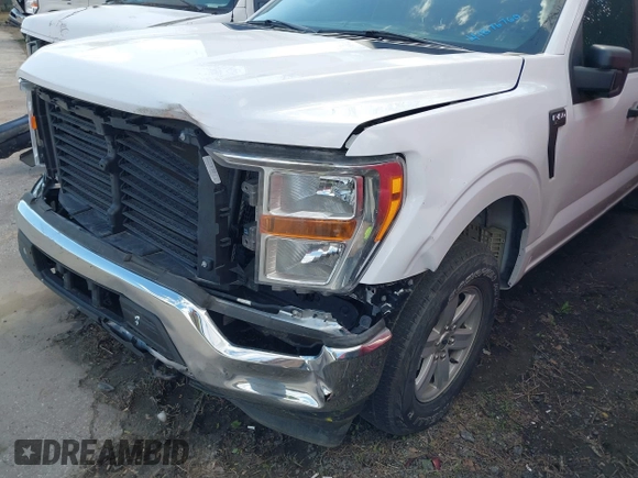 2021 Ford F-150 XL with VIN 1FTFW1E82MKD23506, listed as a IAAI auction lot 41876760 with 71,387 mi miles. Bid and sale history available at carsss.com. Image 13.