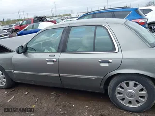 2003 Mercury Grand Marquis LS Premium with VIN 2MEFM75W33X655360, listed as a IAAI auction lot 41922734 with 86,059 mi miles. Bid and sale history available at carsss.com. Image 15.