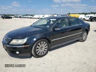 2005 Volkswagen Phaeton z VIN WVWAF03D658003589, wystawiony jako Copart lot #74049134 z przebiegiem 124 506 mil mil oraz Tytuł czysty. Historia ofert i sprzedaży dostępna na DreamBid. Obrazek 1.