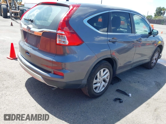 2015 Honda CR-V EX with VIN 3CZRM3H58FG711070, listed as a IAAI auction lot 41948788 with 140,130 mi miles and . Bid and sale history available at carsss.com. Image 4.