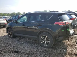 2018 Toyota RAV4 XLE with VIN 2T3RFREV0JW765995, listed as a Copart auction lot 63968785 with 114,598 mi miles and Salvage title. Bid and sale history available at DreamBid. Image 2.