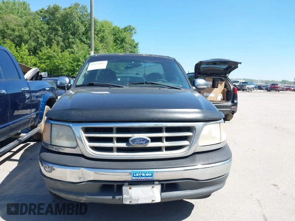 2000 Ford F-150 XL with VIN 1FTRF17L6YKA00872, listed as a IAAI auction lot 42195407 with 210,209 mi miles and . Bid and sale history available at DreamBid. Image 6.