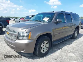 2012 Chevrolet Suburban LT with VIN 1GNSKJE72CR130111, listed as a IAAI auction lot 42699365 with 216,827 mi miles and . Bid and sale history available at DreamBid. Image 2.