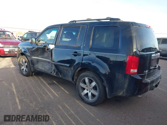 2012 Honda Pilot Touring with VIN 5FNYF4H93CB077057, listed as a IAAI auction lot 41156160 with 139,834 mi miles and . Bid and sale history available at DreamBid. Image 3.