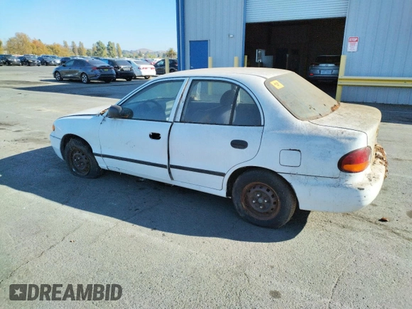 1997 Hyundai Accent z VIN KMHVF24NXVU373676, wystawiony jako Copart lot #77866484 z przebiegiem 151 949 mil mil oraz Tytuł czysty. Historia ofert i sprzedaży dostępna na DreamBid. Obrazek 2.