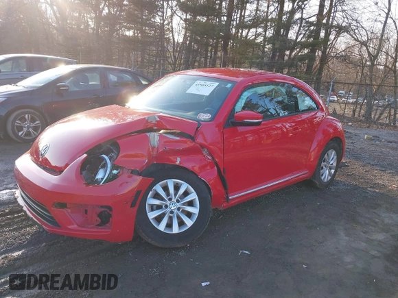 2019 Volkswagen Beetle S with VIN 3VWFD7AT1KM712384, listed as a IAAI auction lot 41505127 with 49,527 mi miles and . Bid and sale history available at DreamBid. Image 2.
