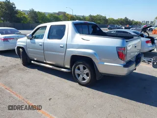 2012 Honda Ridgeline RTL with VIN 5FPYK1F56CB457687, listed as a IAAI auction lot 42582331 with 96,357 mi miles and . Bid and sale history available at DreamBid. Image 3.