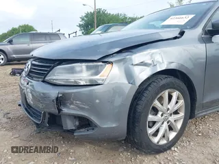 2013 Volkswagen Jetta SE with VIN 3VWDX7AJ7DM426720, listed as a IAAI auction lot 42366632 with 142,318 mi miles and . Bid and sale history available at DreamBid. Image 6.