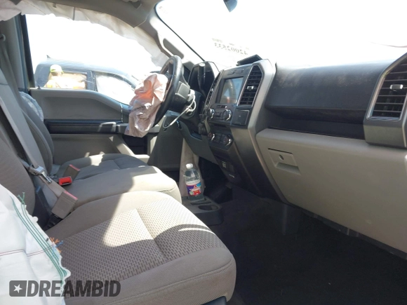 2018 Ford F-150 XL z VIN 1FTEW1CP5JKD12694, wystawiony jako IAAI lot #42002533 z przebiegiem 94 027 mil mil oraz . Historia ofert i sprzedaży dostępna na DreamBid. Obrazek 5.