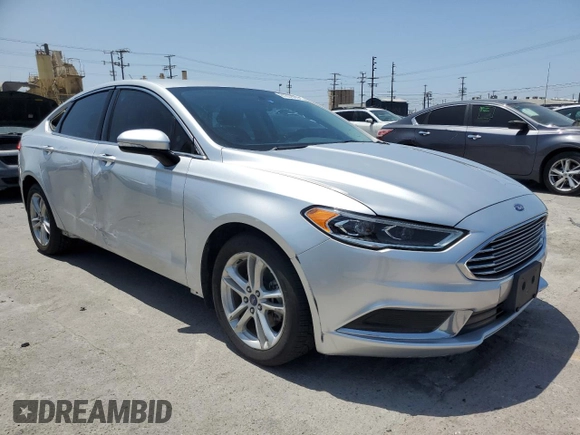 2018 Ford Fusion SE z VIN 3FA6P0LU8JR110693, wystawiony jako Copart lot #61931995 z przebiegiem 119 629 mil mil oraz Szkoda całkowita • Salvage title. Historia ofert i sprzedaży dostępna na DreamBid. Obrazek 4.