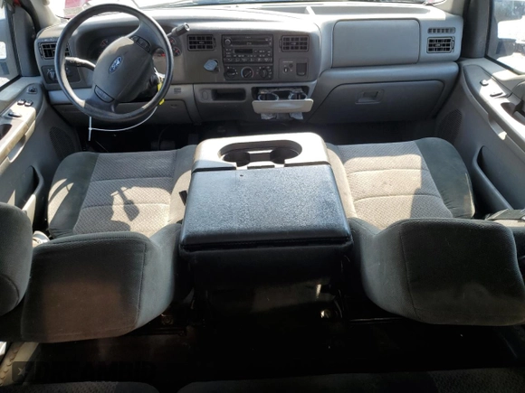 2003 Ford F-250 XL with VIN 1FTNX21L93EA90875, listed as a Copart auction lot 60304115 with 136,956 mi miles and Salvage title. Bid and sale history available at DreamBid. Image 8.