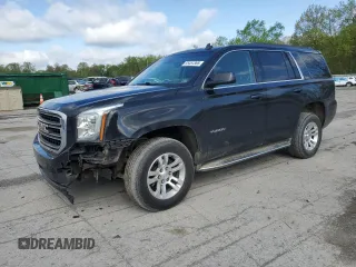 2015 GMC Yukon SLT with VIN 1GKS2BKC6FR145140, listed as a Copart auction lot 55451365 with 216,522 mi miles and Salvage Title. Bid and sale history available at DreamBid. Image 1.
