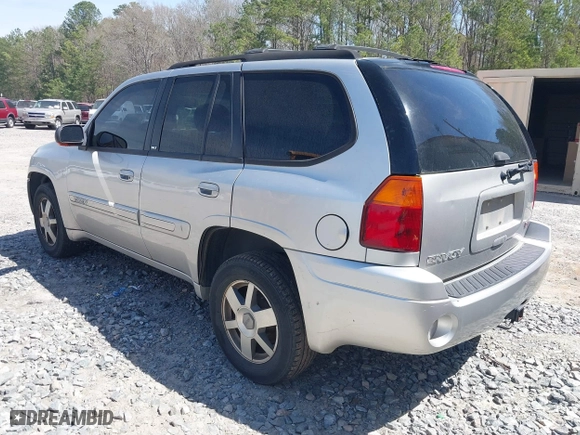 2005 GMC Envoy SLE with VIN 1GKDS13S652390259, listed as a IAAI auction lot 41825258 with 162,172 mi miles. Bid and sale history available at carsss.com. Image 3.