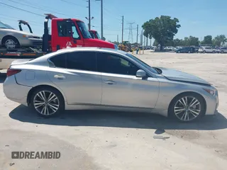 2018 Infiniti Q50 Luxe with VIN JN1EV7AP7JM358611, listed as a IAAI auction lot 42579521 with 102,922 mi miles and . Bid and sale history available at DreamBid. Image 14.