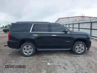 2017 Chevrolet Tahoe LT with VIN 1GNSCBKCXHR342170, listed as a IAAI auction lot 42137766 with 76,854 mi miles and . Bid and sale history available at DreamBid. Image 13.