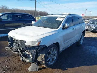 2014 Jeep Grand Cherokee Summit with VIN 1C4RJFJT4EC500362, listed as a IAAI auction lot 41332347 with 159,197 mi miles. Bid and sale history available at carsss.com. Image 18.