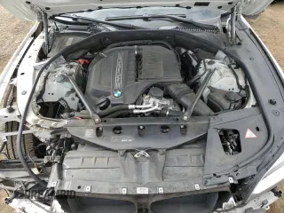 2013 BMW 7 Series 740i with VIN WBAYA6C58DC995137, listed as a Copart auction lot 75774104 with 61,847 mi miles and Salvage Title. Bid and sale history available at carsss.com. Image 11.
