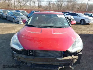 2012 Hyundai Veloster w/Gray Int with VIN KMHTC6AD7CU056647, listed as a IAAI auction lot 41434535 with 68,691 mi miles. Bid and sale history available at carsss.com. Image 6.