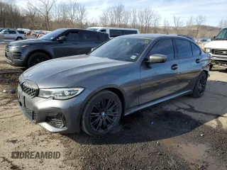 2020 BMW 3 Series M340i xDrive with VIN WBA5U9C02LFH17348, listed as a Copart auction lot 45452545 with 56,869 mi miles and Salvage Title. Bid and sale history available at DreamBid. Image 1.