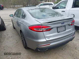 2020 Ford Fusion Titanium с VIN 3FA6P0K91LR128016, выставлен на аукционе IAAI как лот 41947905 с пробегом 79 622 миль миль и . История ставок и продаж доступна на DreamBid. Изображение 3.