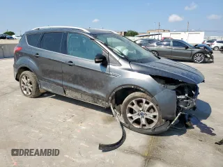 2015 Ford Escape Titanium z VIN 1FMCU0J92FUA07768, wystawiony jako Copart lot #53382545 z przebiegiem Nie podano mil oraz Szkoda całkowita • Salvage title. Historia ofert i sprzedaży dostępna na DreamBid. Obrazek 4.