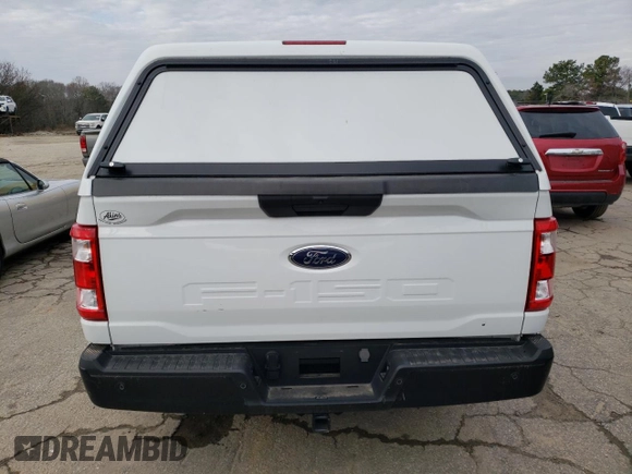 2023 Ford F-150 XL with VIN 1FTMF1CB7PKE34062, listed as a Copart auction lot 85287124 with Not Provided miles and Salvage Title. Bid and sale history available at carsss.com. Image 6.