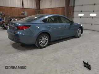 2014 Mazda 6 i Sport with VIN JM1GJ1U61E1148983, listed as a IAAI auction lot 41977553 with 100,668 mi miles and . Bid and sale history available at DreamBid. Image 4.