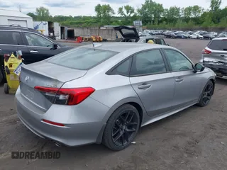2023 Honda Civic Sport with VIN 2HGFE2F55PH501595, listed as a IAAI auction lot 42355942 with 8,924 mi miles and . Bid and sale history available at DreamBid. Image 4.