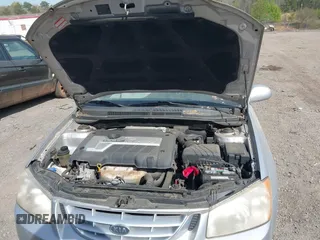2005 Kia Spectra LX with VIN KNAFE121355203561, listed as a IAAI auction lot 41894533 with 32,889 mi miles. Bid and sale history available at carsss.com. Image 10.