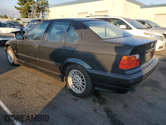 1997 BMW 3 Series 328iA with VIN WBACD4325VAV48712, listed as a Copart auction lot 80376064 with 158,118 mi miles and Salvage Title. Bid and sale history available at carsss.com. Image 2.