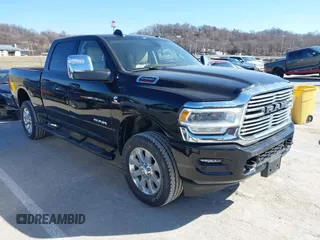 2023 Ram 2500 Laramie with VIN 3C6UR5FL5PG580770, listed as a IAAI auction lot 41734269 with 16,970 mi miles and . Bid and sale history available at DreamBid. Image 1.