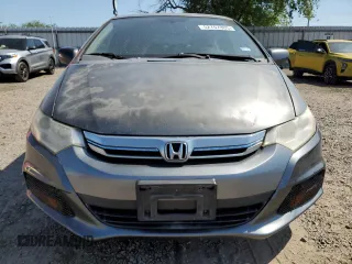 2012 Honda Insight z VIN JHMZE2H34CS003929, wystawiony jako Copart lot #52707885 z przebiegiem 131 596 mil mil oraz Szkoda całkowita • Salvage title. Historia ofert i sprzedaży dostępna na DreamBid. Obrazek 5.