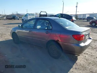 2004 Toyota Corolla CE with VIN 1NXBR38EX4Z265969, listed as a IAAI auction lot 41948986 with 235,816 mi miles. Bid and sale history available at carsss.com. Image 3.