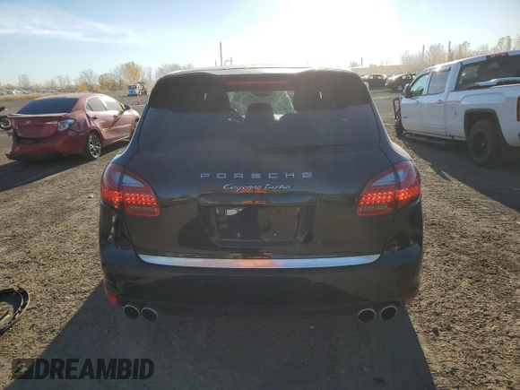 2012 Porsche Cayenne Turbo with VIN WP1AC2A26CLA82602, listed as a Copart auction lot 77752814 with 115,965 mi miles and Salvage title. Bid and sale history available at DreamBid. Image 6.