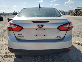 2013 Ford Focus SE с VIN 1FADP3F25DL297218, выставлен на аукционе Copart как лот 61731535 с пробегом 189 960 миль миль и Списание • Salvage title. История ставок и продаж доступна на DreamBid. Изображение 6.